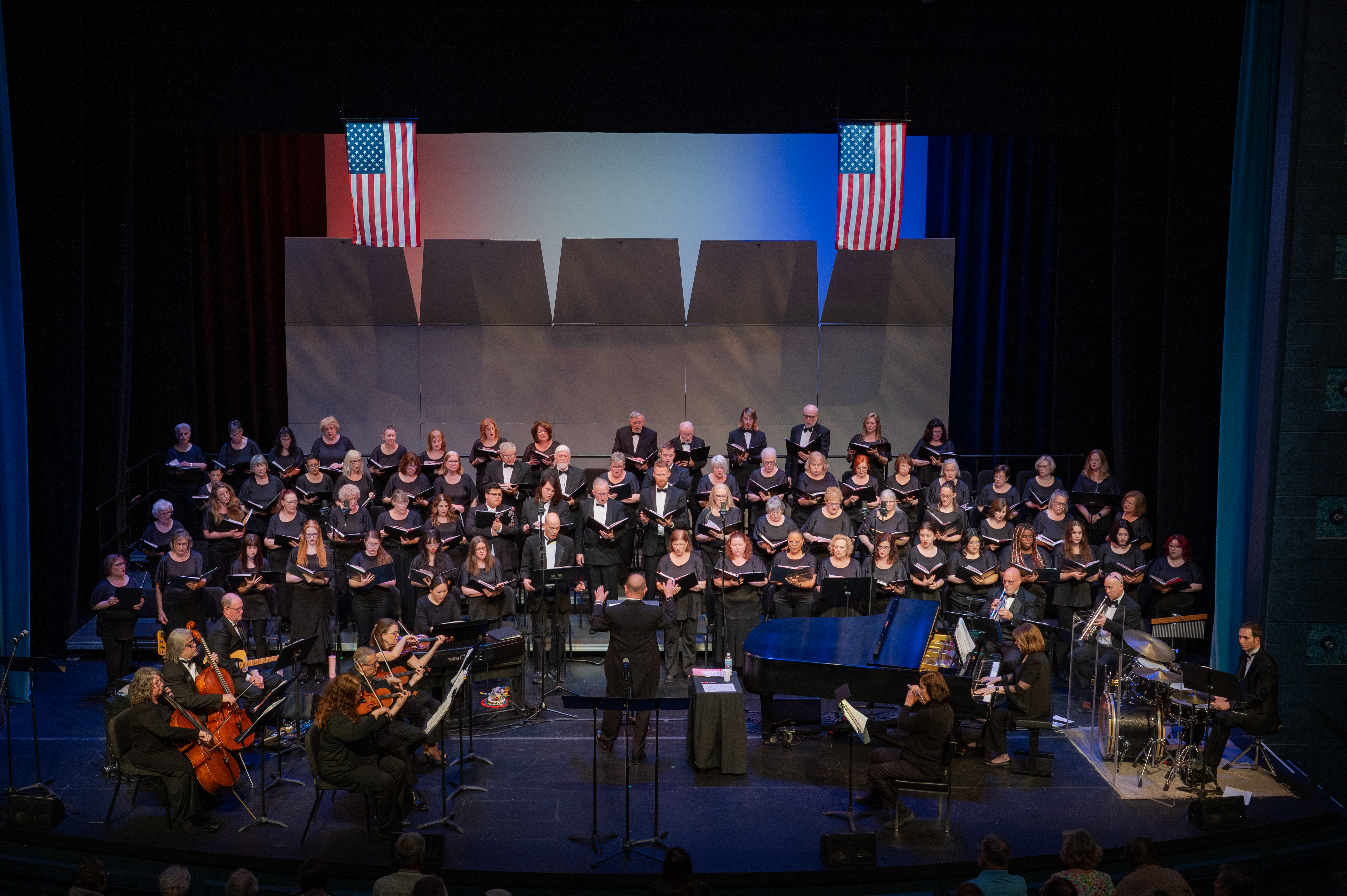 symphony with american flags in the background